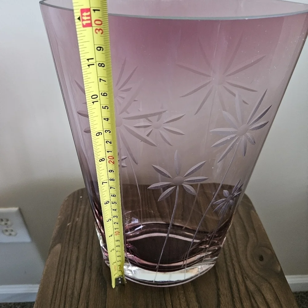 Elegant oval clear cut purple vase.